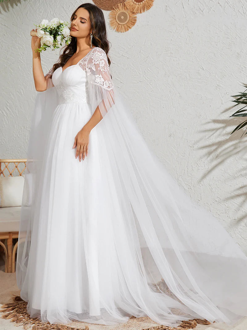 White wedding dress with Long lace and chiffon sleeves.