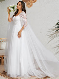 White wedding dress with Long lace and chiffon sleeves.